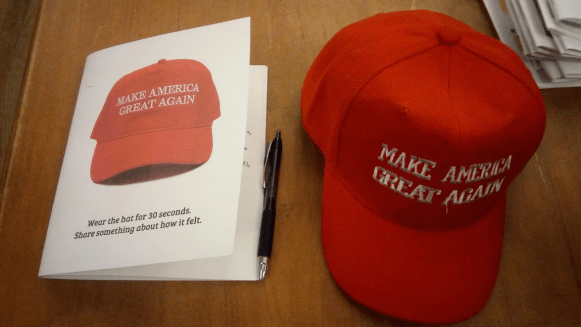 MAGA hat and reflection.png